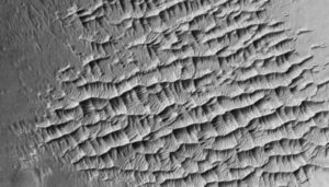 A field of ripples within a crater in Verde Vallis, an ancient river bed on Mars, 500 meters across.