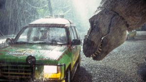 T, rex looking into a ride vehicle in Jurassic Park
